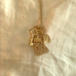 Kendra Scott gold charm necklace